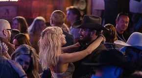 Beth (Kelly Reilly) and Rip (Cole Hauser) dancing in Yellowstone