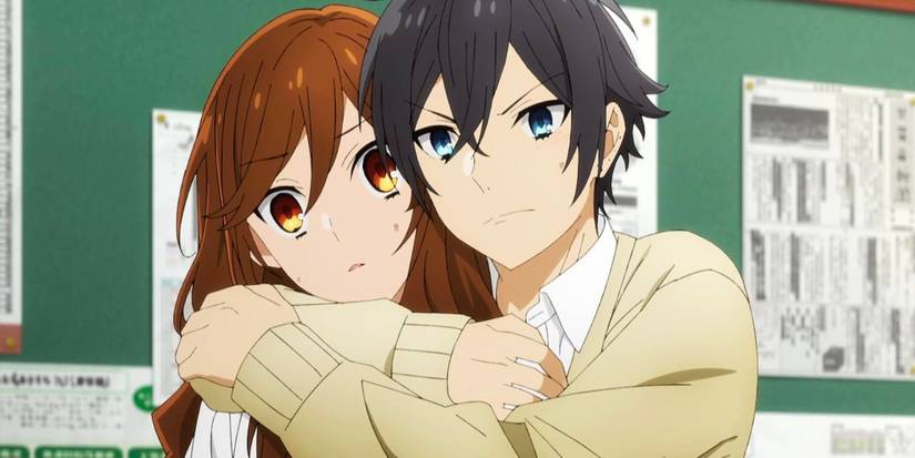 Miyamura possessively hugging Hori in Horimiya.