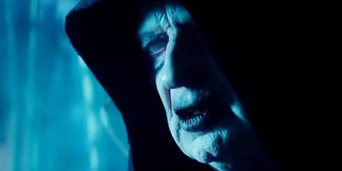The Palpatine clone from Star Wars: The Rise of Skywalker looks out from under his hood with opaque eyes.