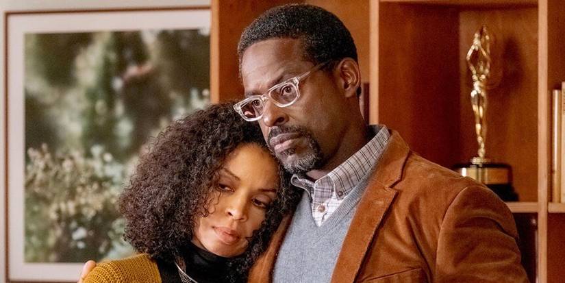 Susan Kelechi Watson resting head on Sterling K. Brown in This Is Us in a flash forward to when they are older