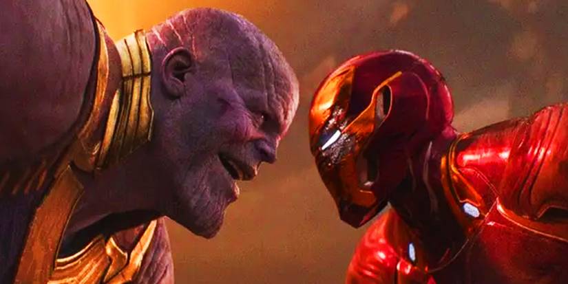 Thanos and Iron Man fighting on тιтan in Avengers Infinity War