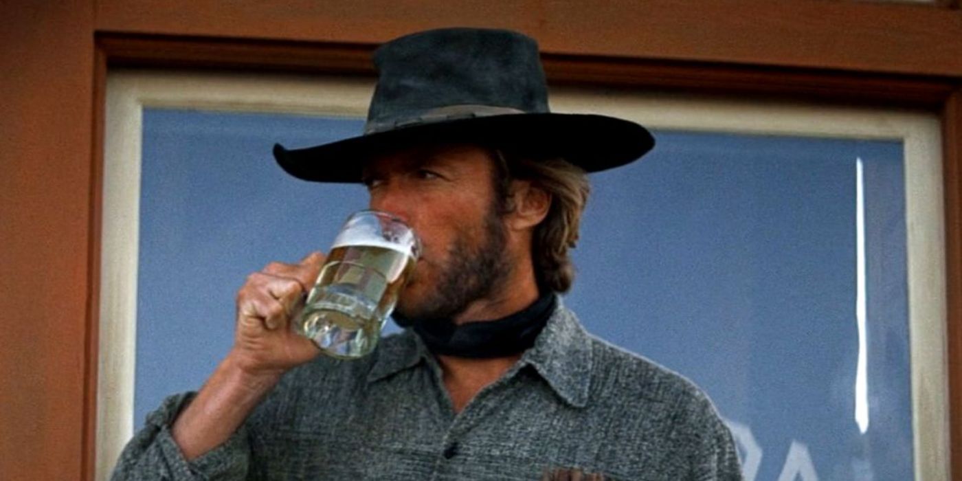 The Stranger drinking from a glass in High Plains Drifter