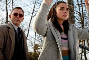 Ana de Armas as Marta and Daniel Craig as Detective Blanc in Knives Out