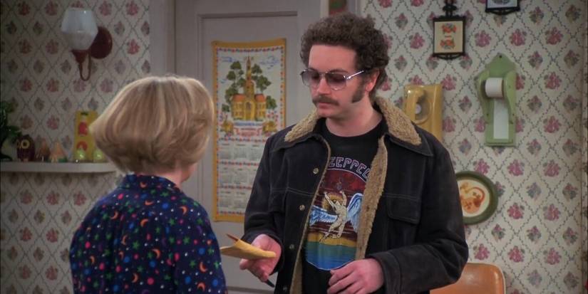 Steven Hyde and Kitty Forman in Season 8, Episode 22, “That '70s Finale”