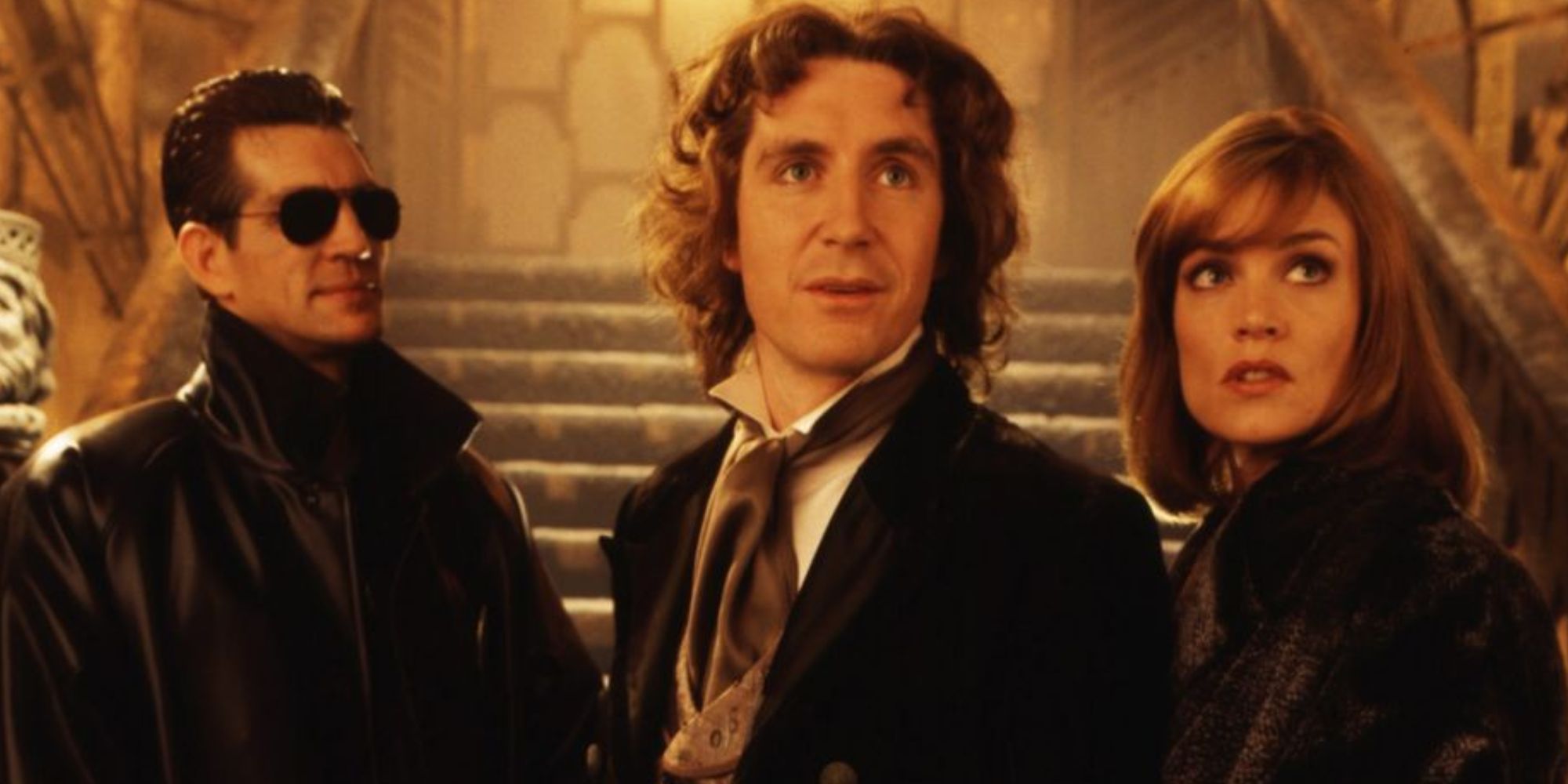 Paul McGann as the Eighth Doctor with Grace and the Master in the Doctor Who movie.
