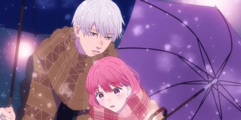 A Sign of Affection key anime visual with the two leads close to each other as it snows and they have umbrellas.