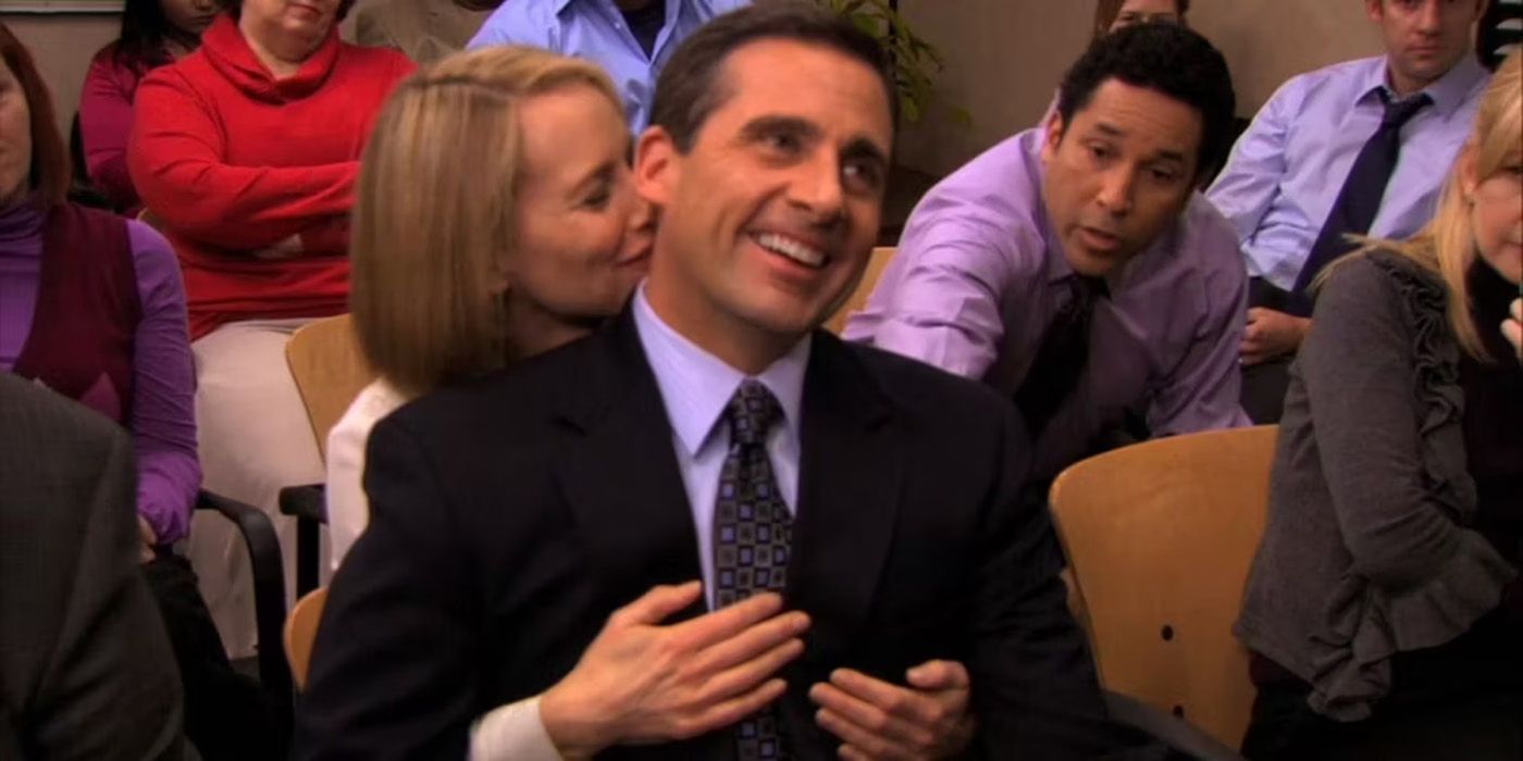 An image of Holly kissing Michael's cheek in The Office