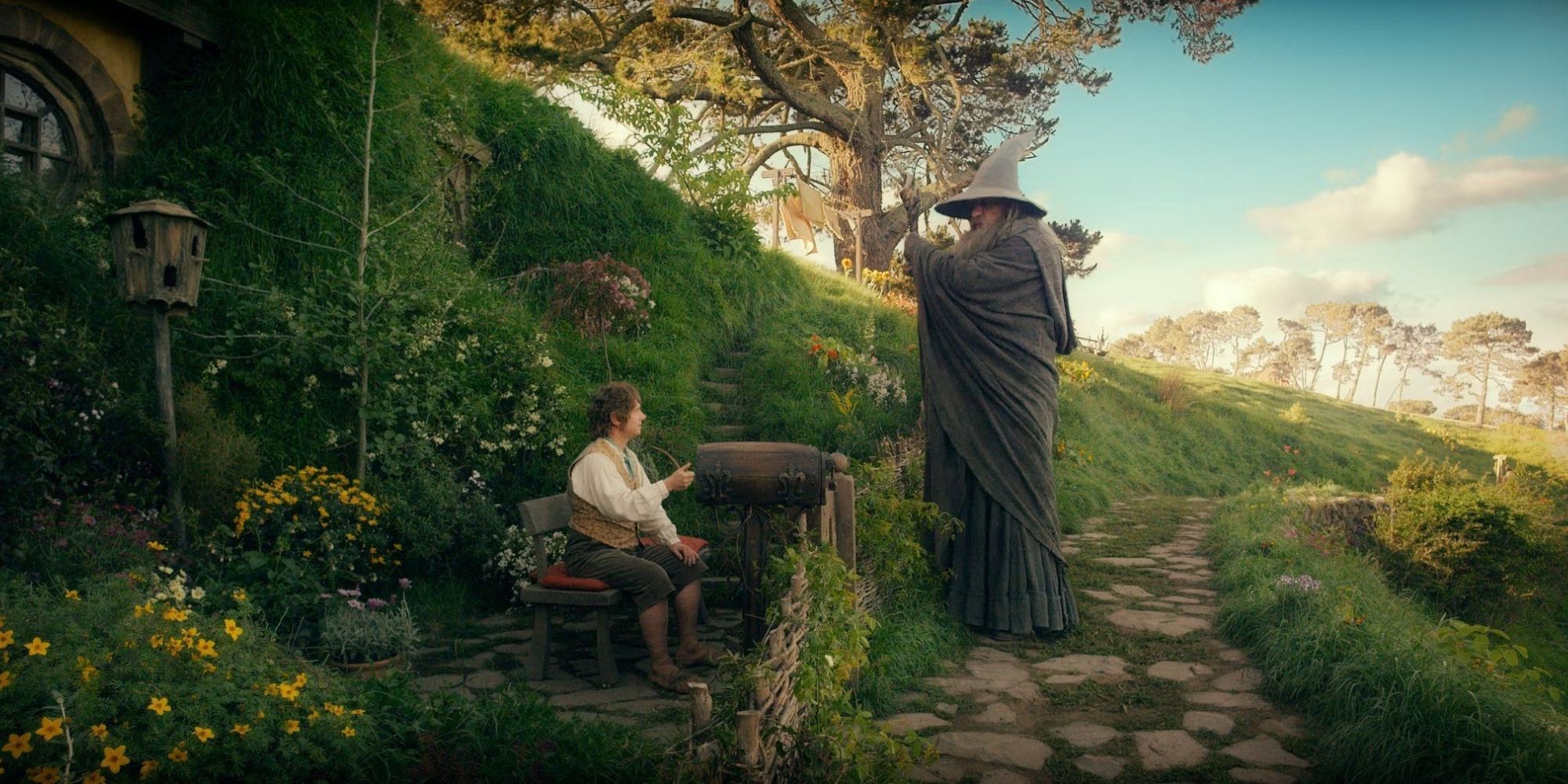 Martin Freeman as Bilbo Baggins and Ian McKellen as Gandalf in the Shire near Bilbo's Hobbit Hole