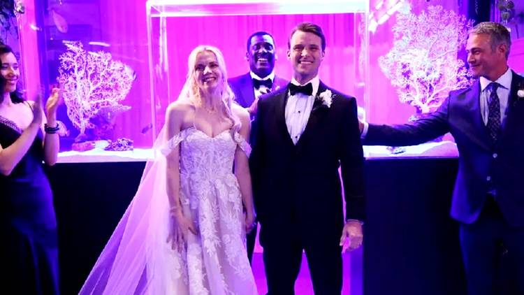 Casey and Brett at the altar smiling in Chicago Fire season 12 episode 6