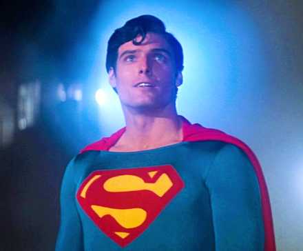 Christopher Reeve In Costume As Superman Staring Up Into The Sky In Superman 1978 Movie