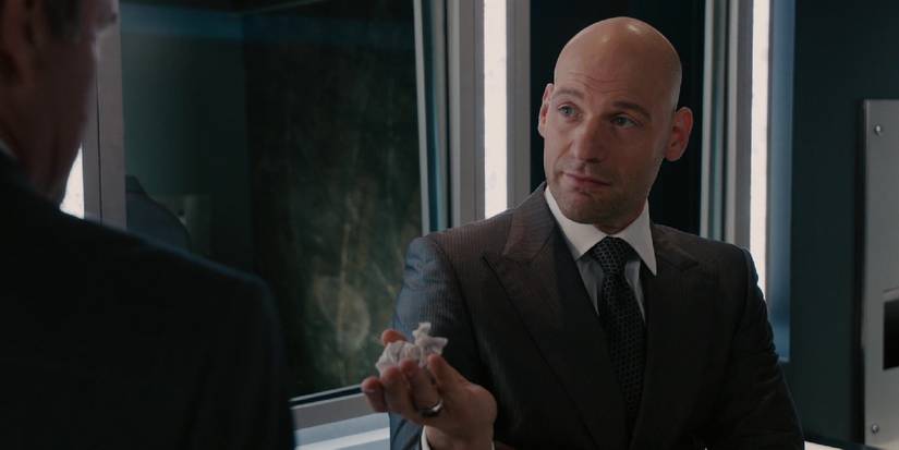 Corey Stoll as Darren Cross holding a tissue in Ant-Man (2015)