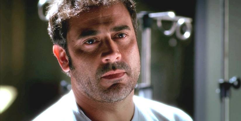 Denny looking on in Grey's Anatomy