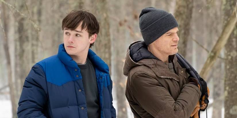 Dexter and Harrison stand in the snowy woods together in Dexter: New Blood