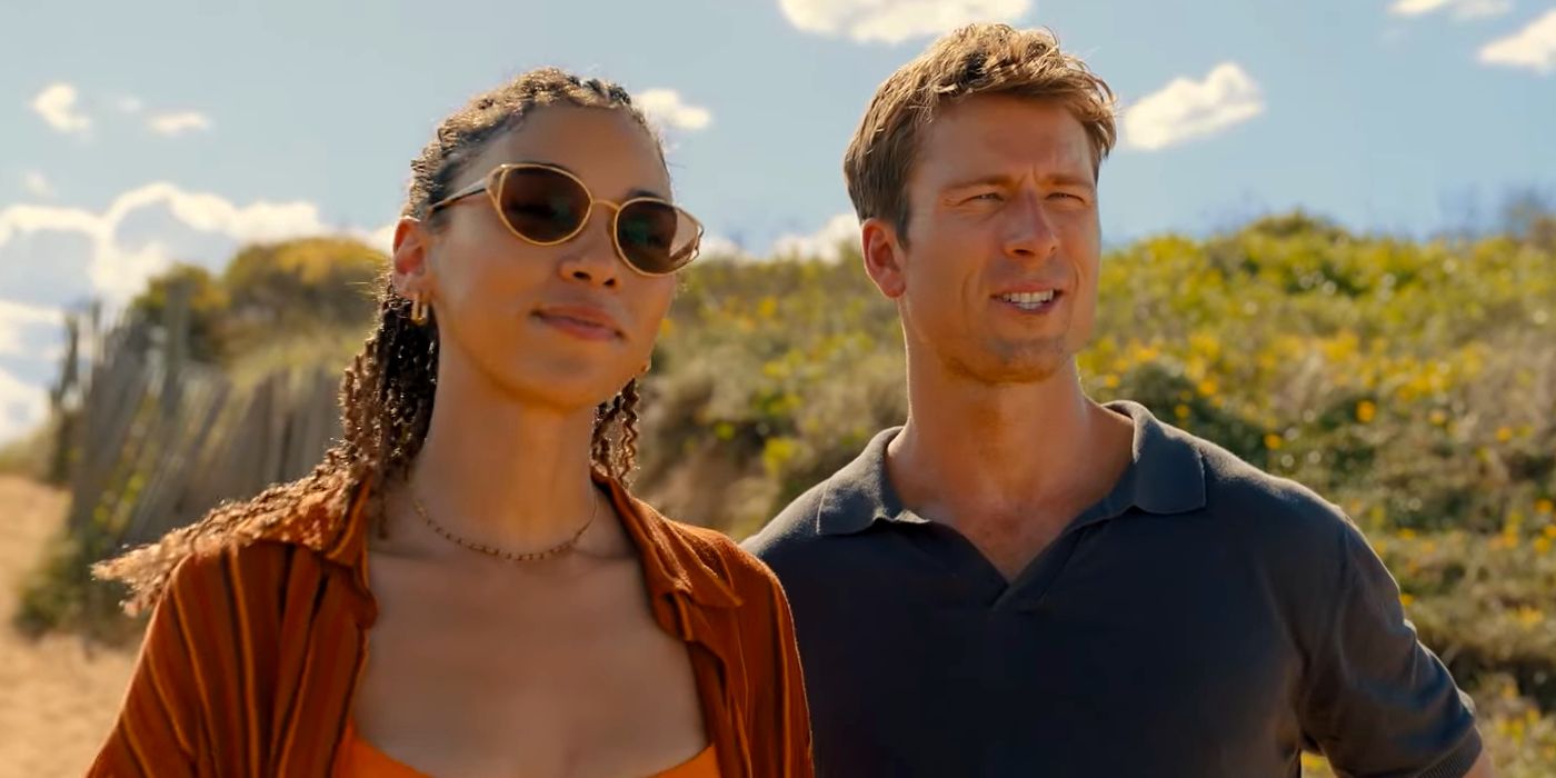 Glen Powell as Ben with Charlee Fraser as Margaret on the Beach in Anyone But You