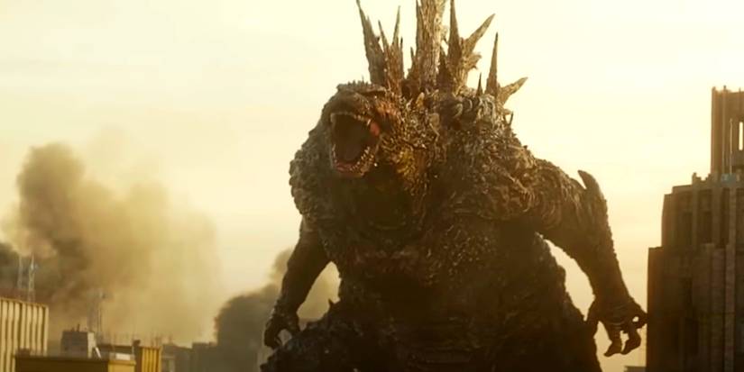 Godzilla roaring in the ruins of a city in Godzilla Minus One.