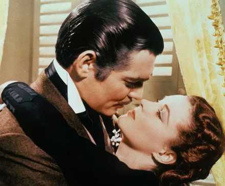 Scarlet and Rhett embrace in Gone With The Wind