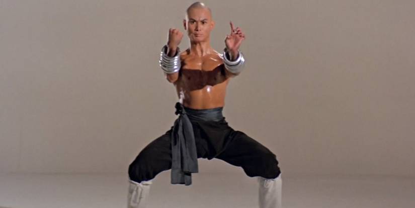 Gordon Liu as Monk San Te adopts the horse stance in The 36th Chamber of Shaolin.