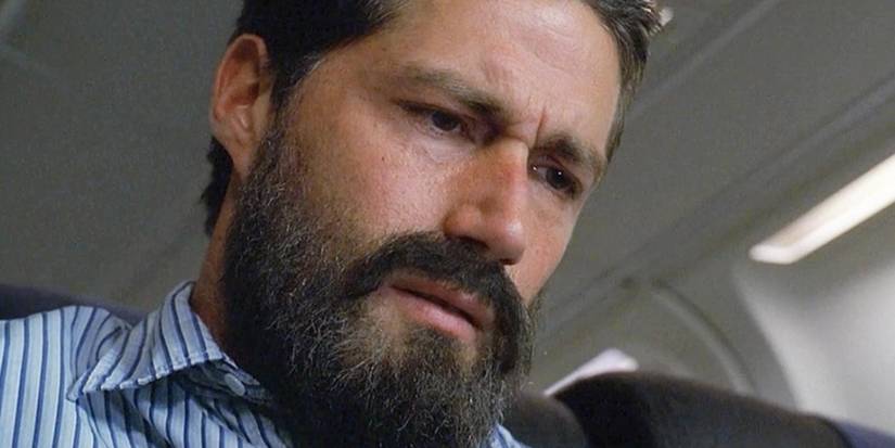 Jack with a beard looking down sadly in the Lost season 3 finale.