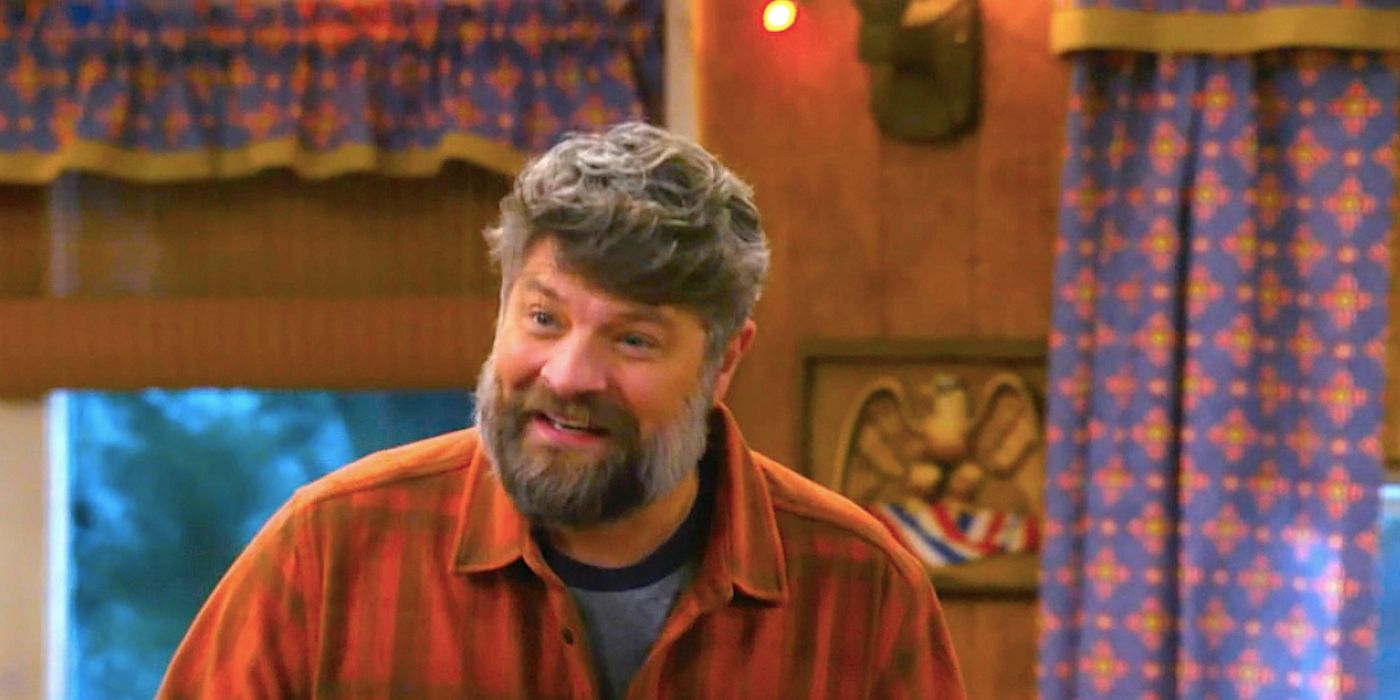 Jay R Ferguson's Ben looking excited in The Conners season 6 episode 1