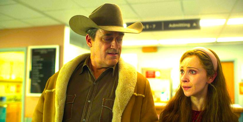 Jon Hamm looks down sneeringly at a worried Juno Temple in a dramatic scene from Fargo season 5