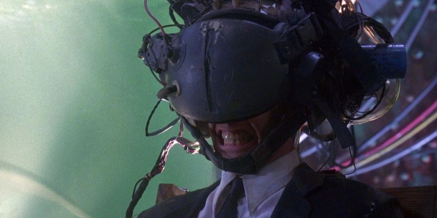 Keanu Reeve as Johnny Mnemonic wears a virtual reality helmet in Johnny Mnemonic.