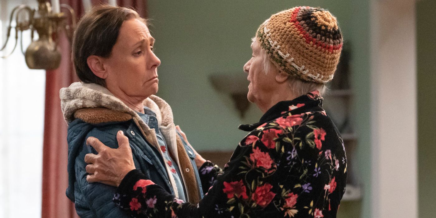 Laurie Metcalf as Jackie and Estelle Parsons as Bev looking and holding onto each other in The Conners