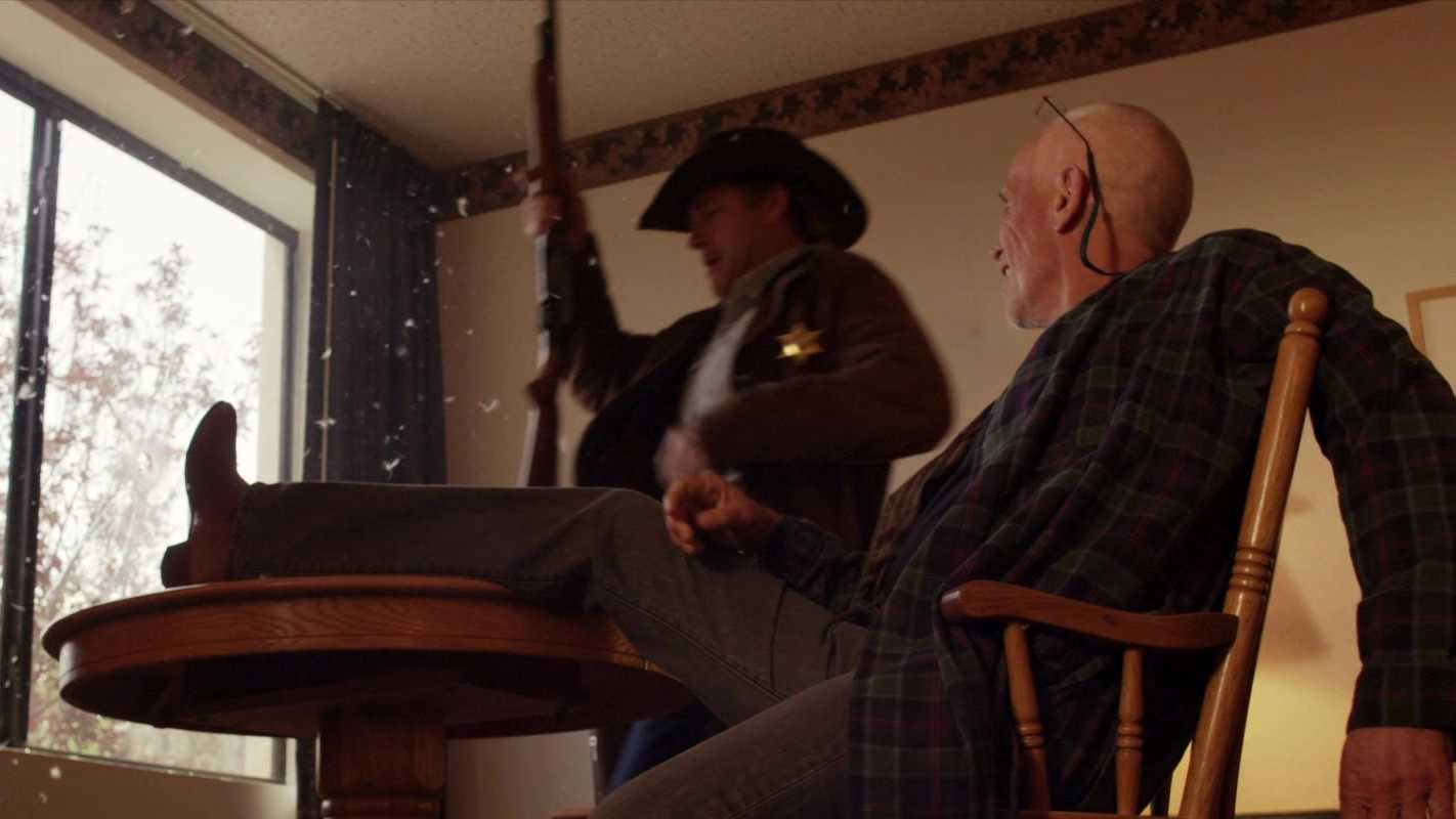 Walt Longmire (Robert Taylor) speaking to Lucian Connally (Peter Weller) in Longmire season 1 episode 6