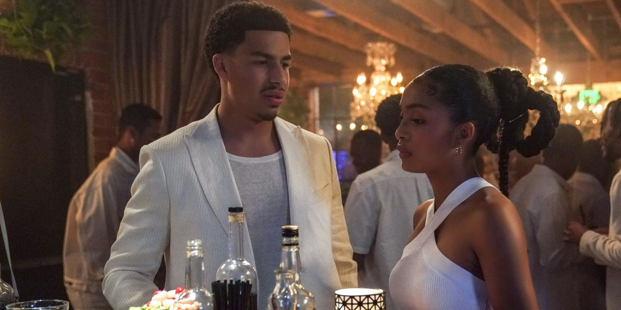 Marcus Scribner and Yaya Shahidi in white on Grown ish