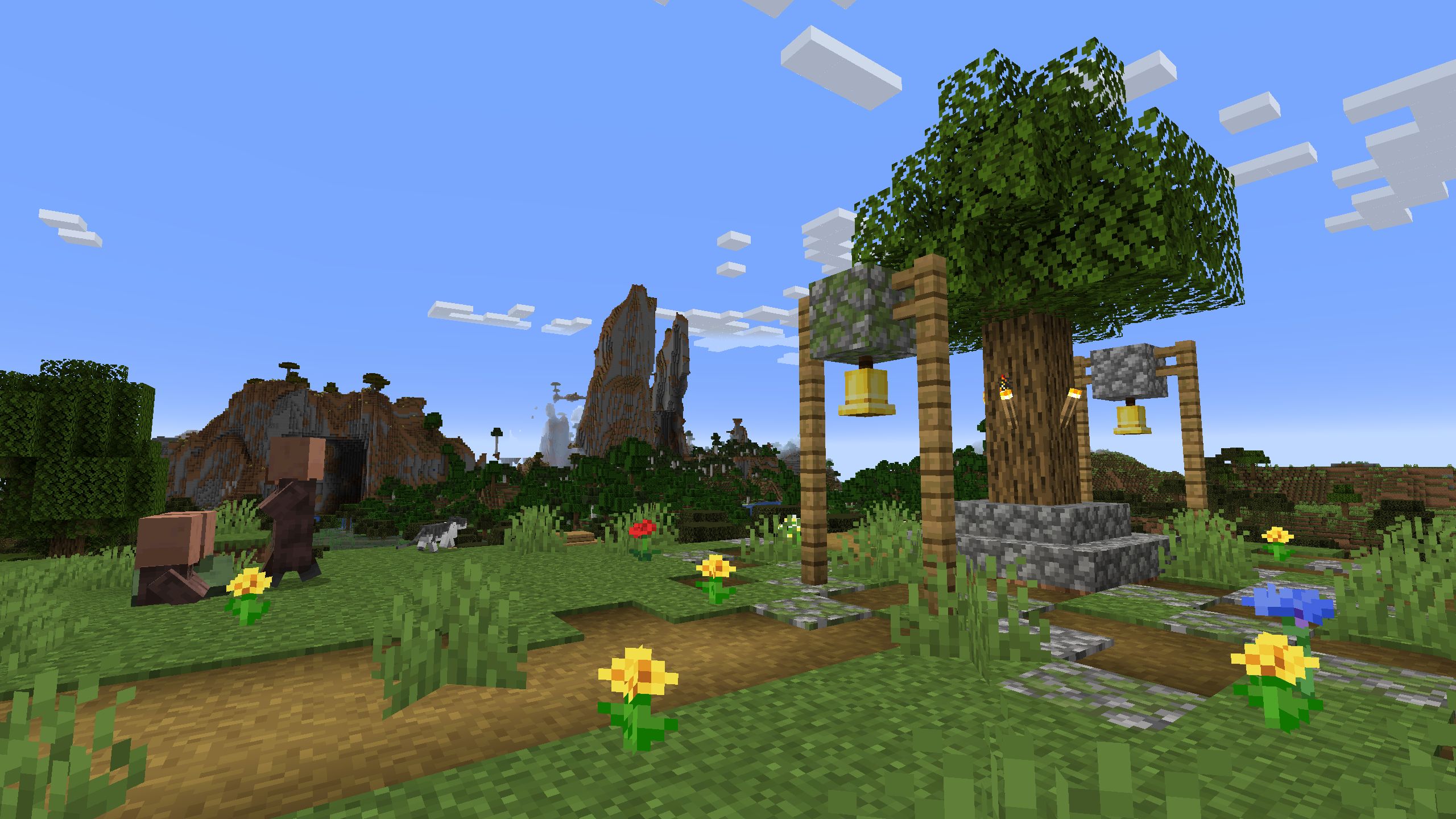 minecraft-villagers-roaming-near-village-bells-and-tree-monument 15 Best Minecraft Seeds For Villages