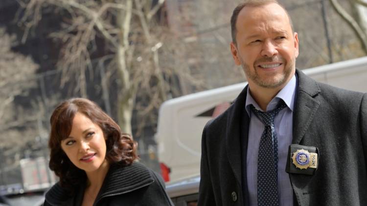 Donnie Wahlberg as Danny and Marisa Ramirez as Baez on the street in Blue Bloods