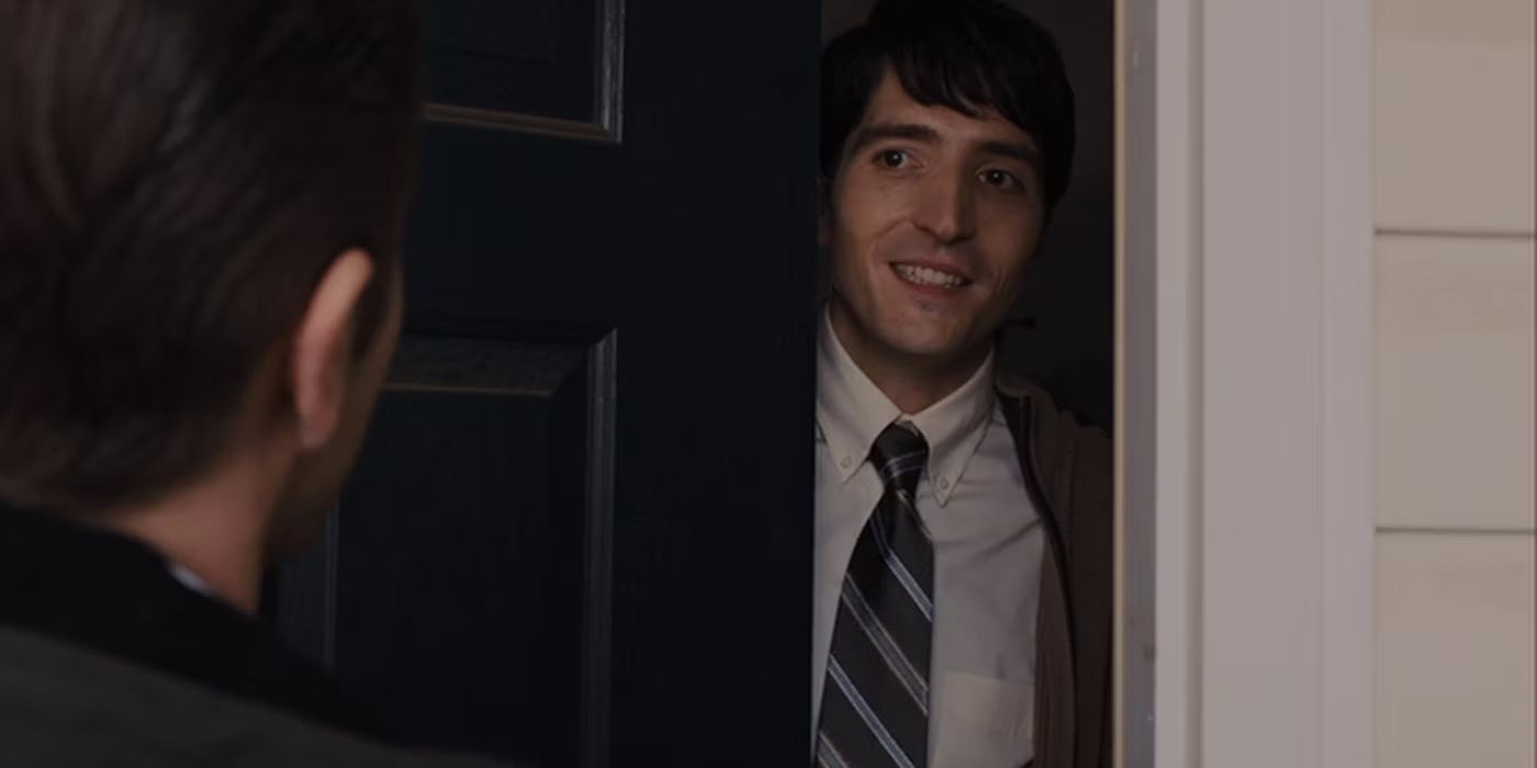 Bob Taylor looking nervous in a doorway Prisoners (2013) (1)-1