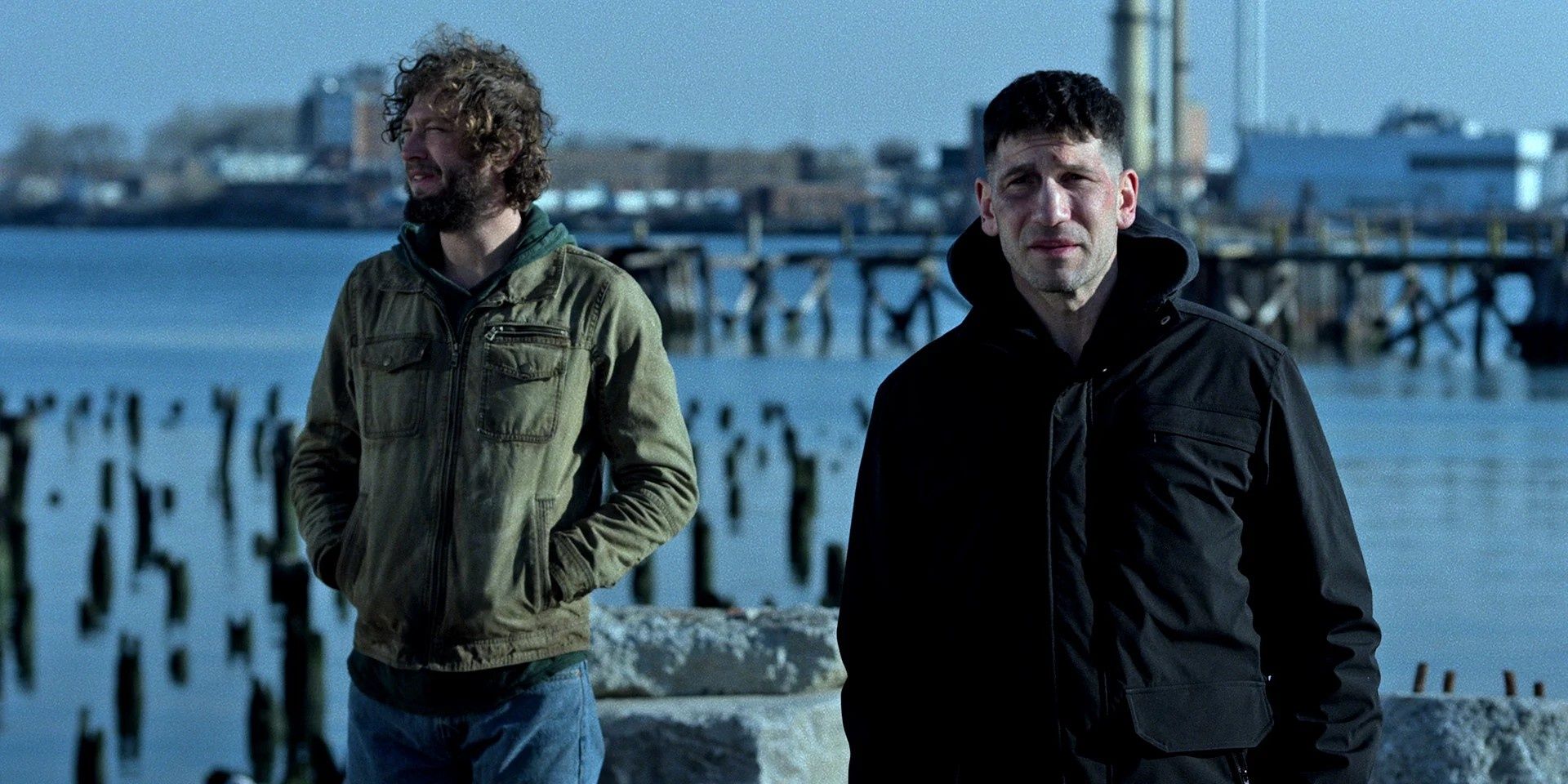 Frank Castle and Microchip by the water in The Punisher