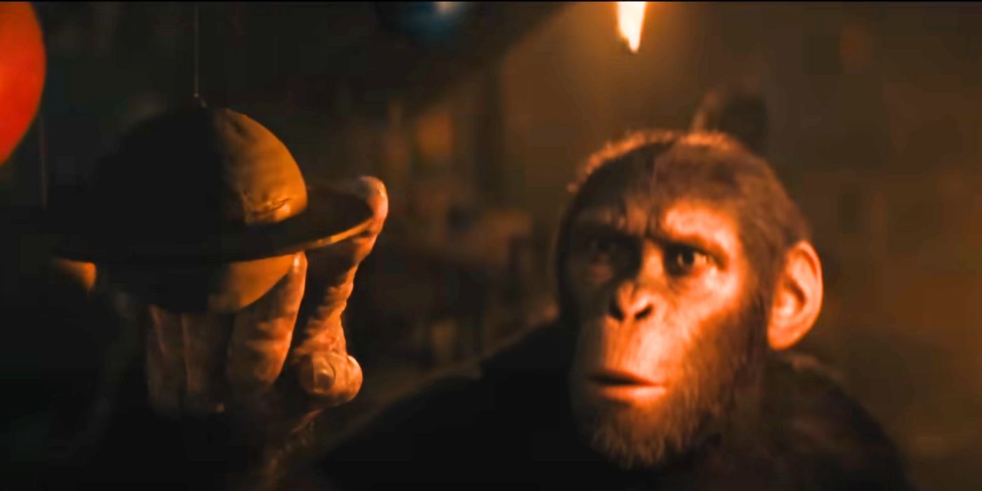 Noa from Kingdom of the Planet of the Apes touches a model solar system