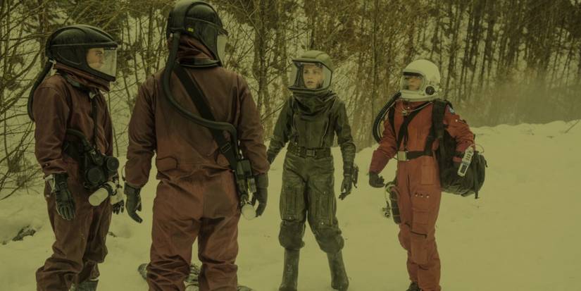 12 Post-Apocalyptic TV Shows, Ranked By How Much You’d Want To Live In What’s Left Of The World 1 Clarke and her friends standing in the ash wearing hazmat suits in The 100 season 4 episode