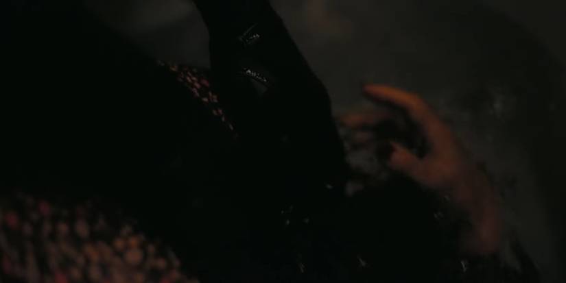 The black glove in Jean Tatlock's (Florence Pugh) death scene in Oppenheimer