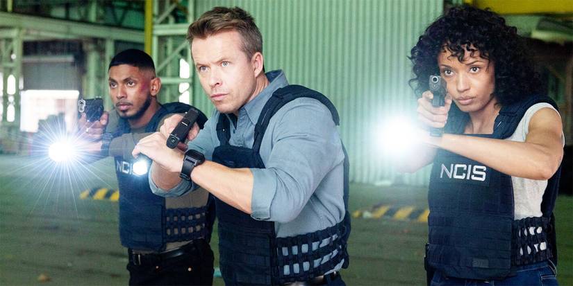 Sean Sagar as DeShawn Jackson with Todd Lasance as JD Dempsey and Olivia Swann as Michelle Mackey with guns in NCIS Sydney