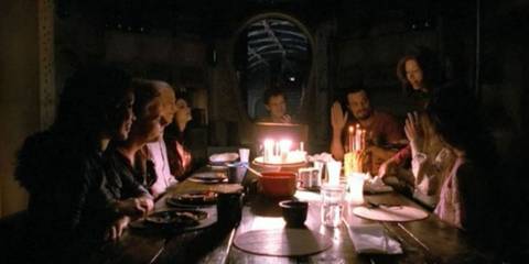 The team of Serenity at a table in Firefly