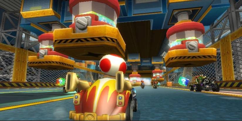 Toads Factory Mario Kart Wii track with Toad driving. 