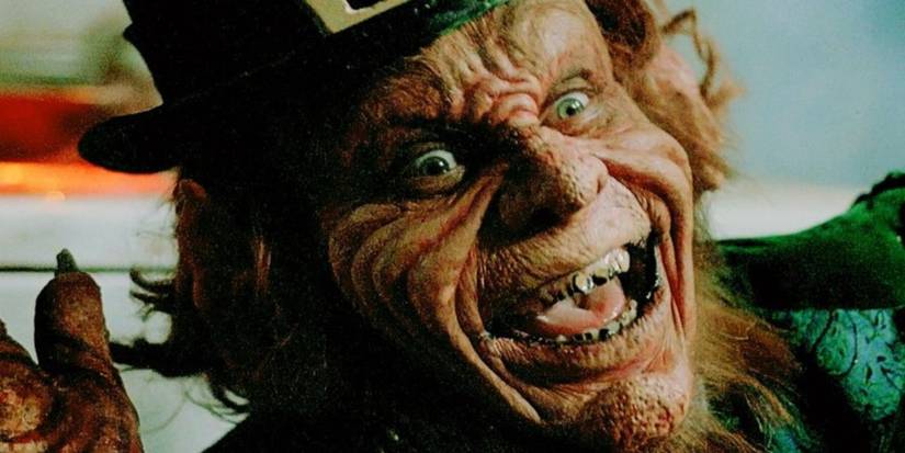 Warwick Davis as Lubdan The Leprechaun smiles in a scene from Leprechaun.
