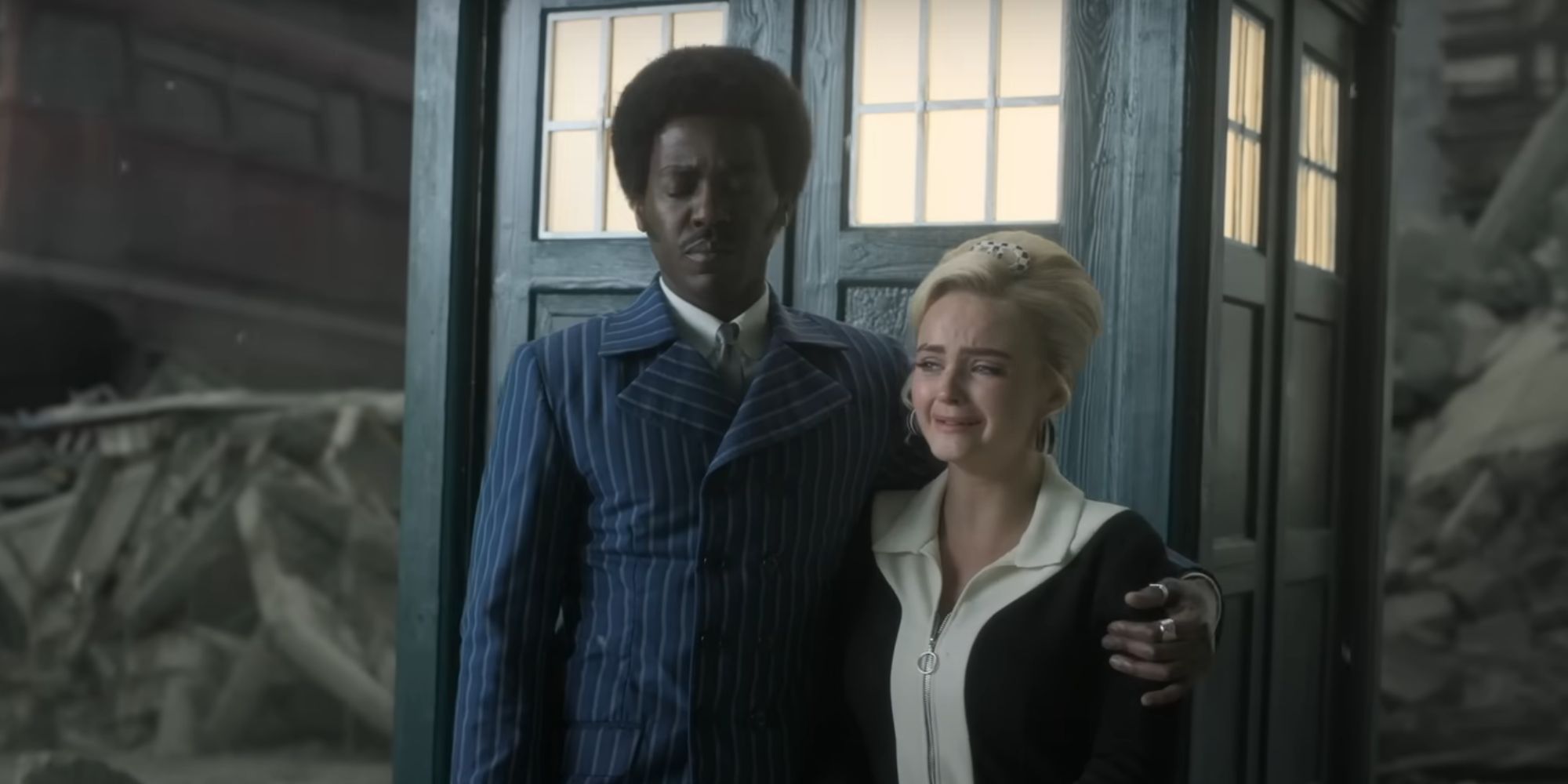 Ncuti Gatwa as the Fifteenth Doctor with his arm around a sobbing Millie Gibson as Ruby Sunday in the Doctor Who season 14 trailer