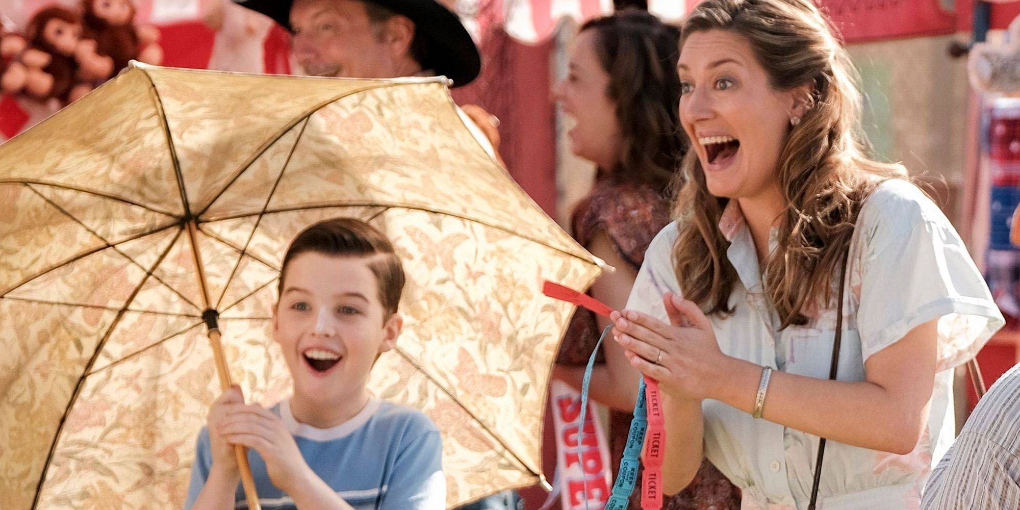 Mary and Sheldon cheering at the carnival in Young Sheldon