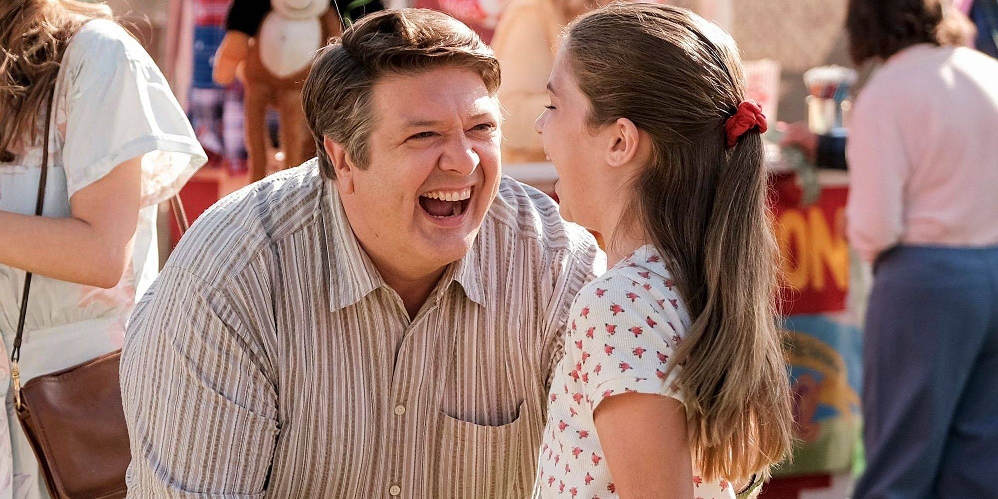 George laughing with Missy at the carnival in Young Sheldon