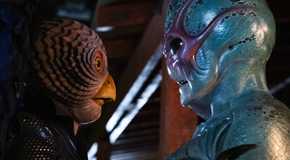 Heather and Harry holding each other in their alien forms in Resident Alien