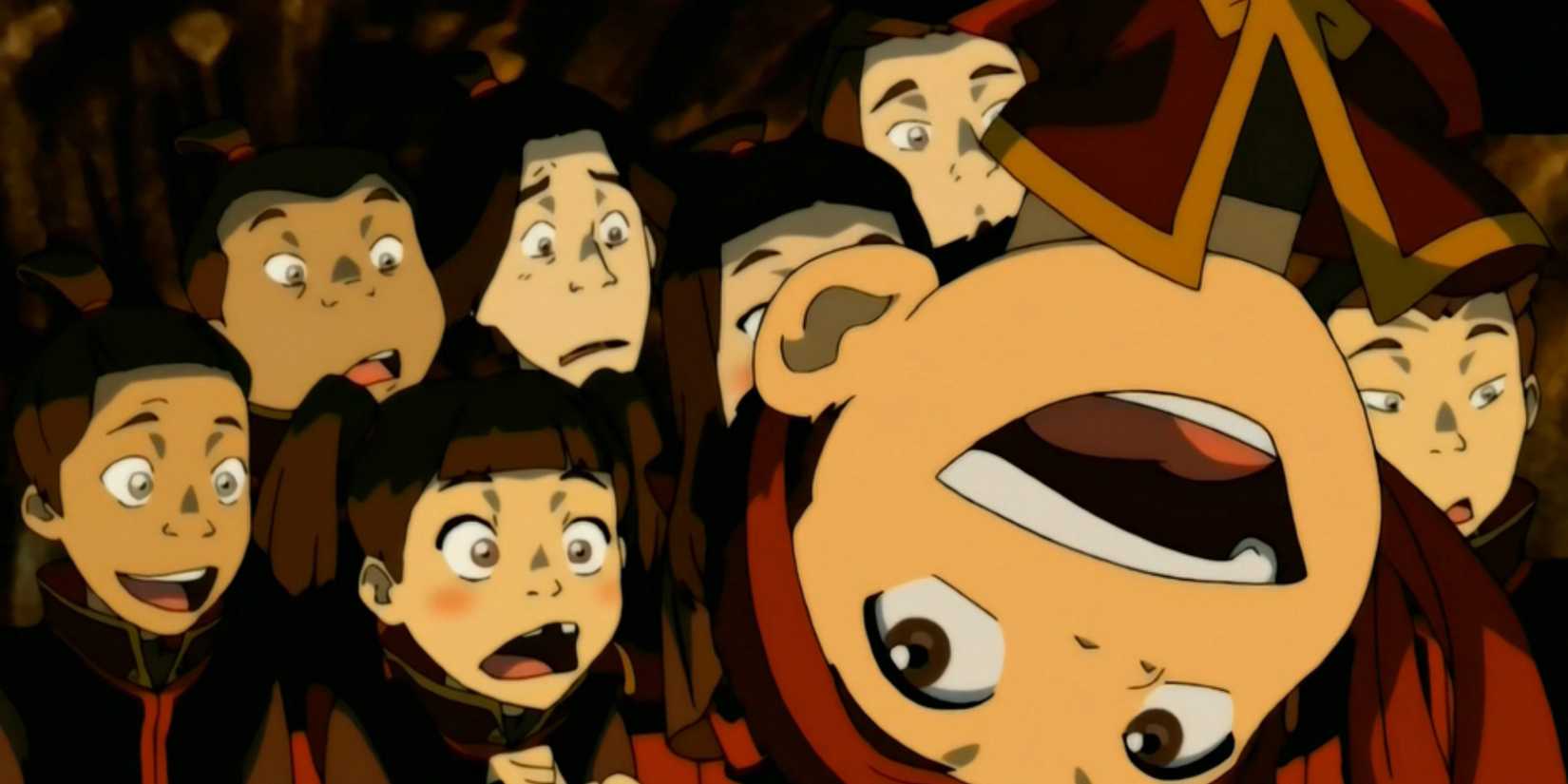 Aang upside down while showing off his dance moves to a group of Fire Nation kids in a cave in the animated Avatar The Last Airbender episode The Headband