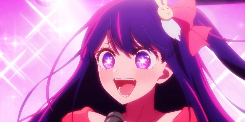 Ai Hoshino smiles after seeing her children cheering in the audience during a performance from Oshi no Ko. 