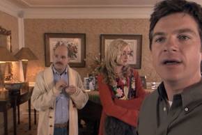 Michael looking off at something and talking while Tobias and Linsday stand behind him at Lucille's penthouse in Arrested Development's pilot.