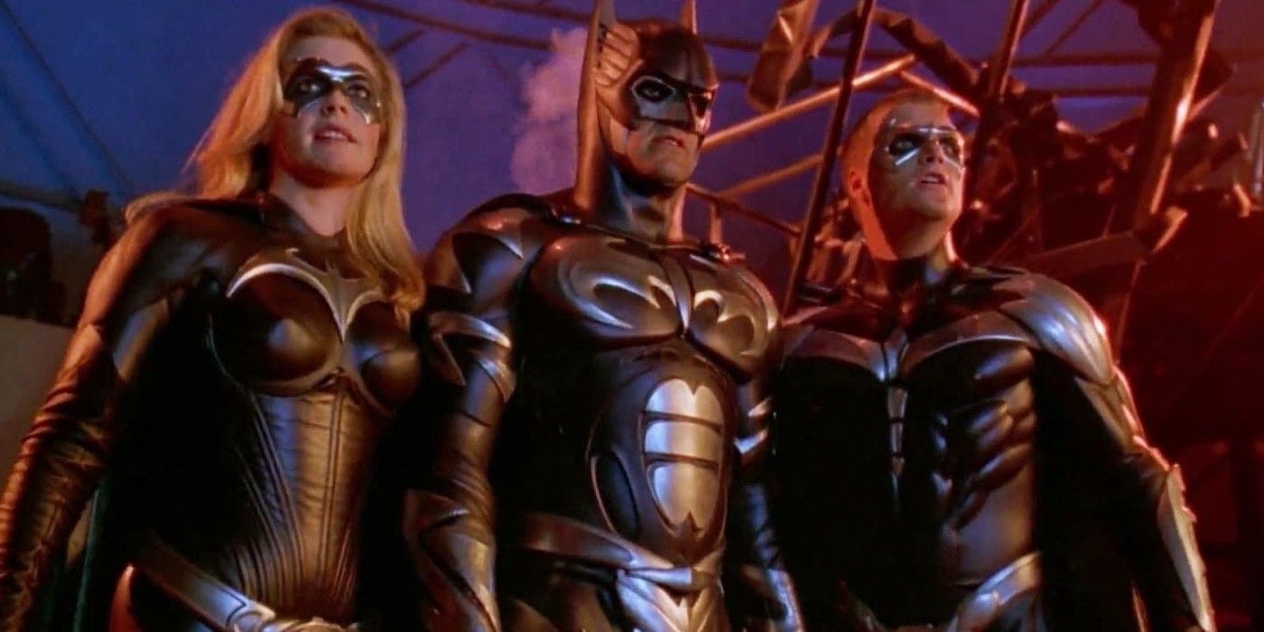 Batman, Batgirl, and Robin stand together as they approach Freeze's lair in Batman & Robin 1997