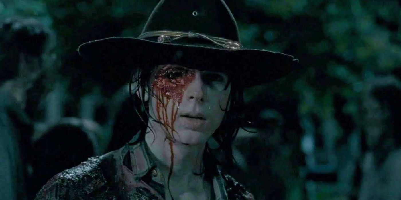 Carl Grimes with a bloodied face after being shot in the eye in The Walking Dead