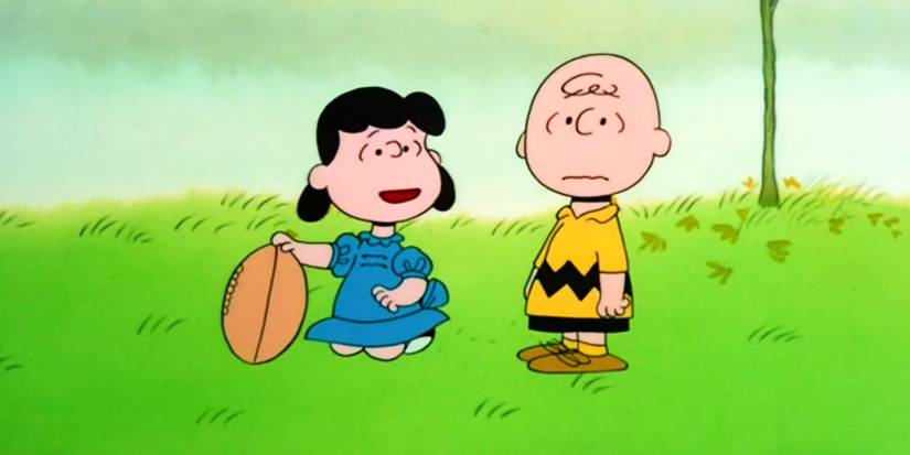 Lucy Holding the Football for Charlie Brown