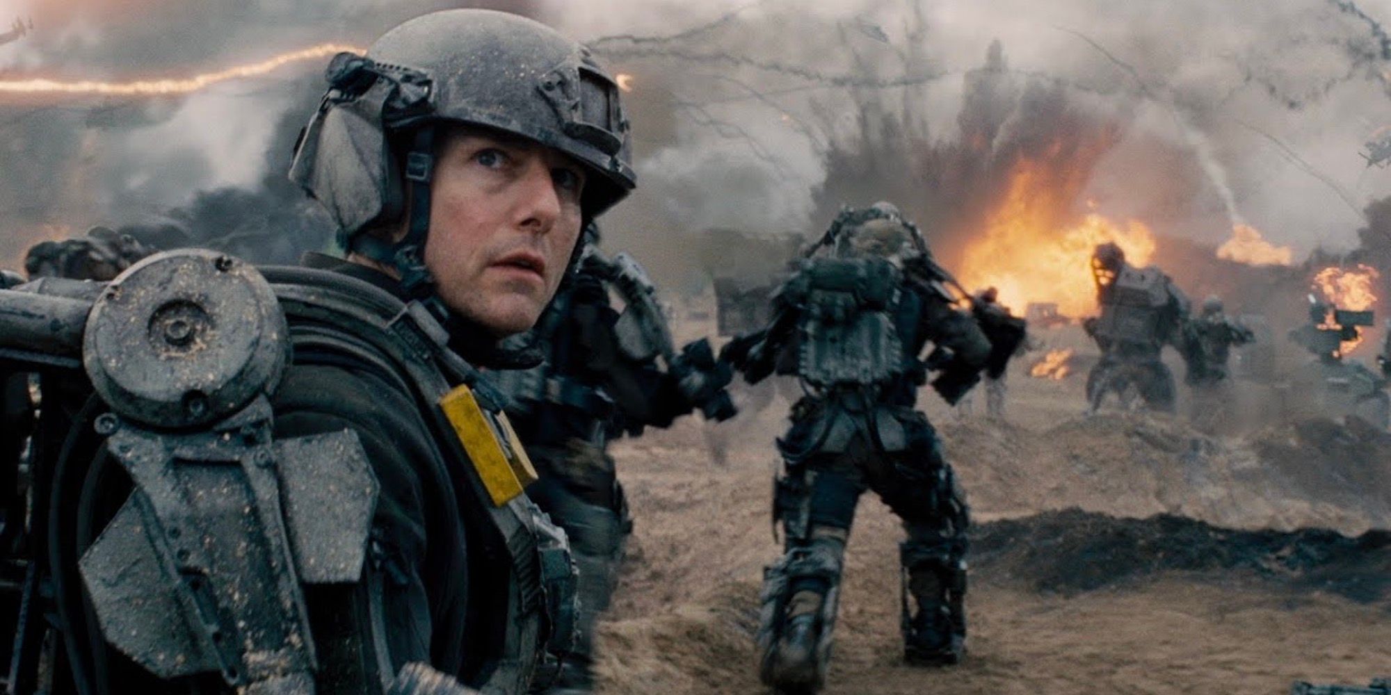 Tom Cruise looking back on a battlefield in the Edge of Tomorrow trailer.